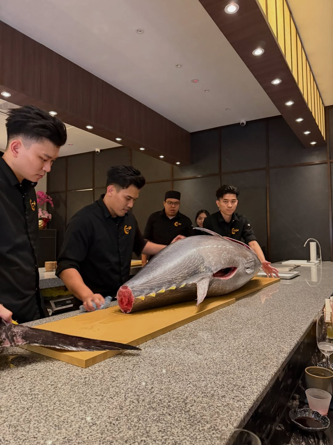 Whole tuna cutting show at the Ichiwa counter